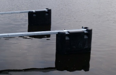 Flytkropp, Pontong for båtbommar